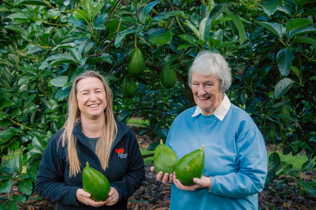 jess fleming and lorna spackman holding the fruit