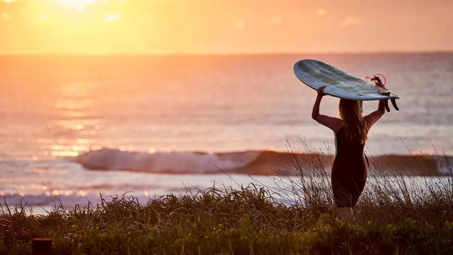 Surfer at sunset