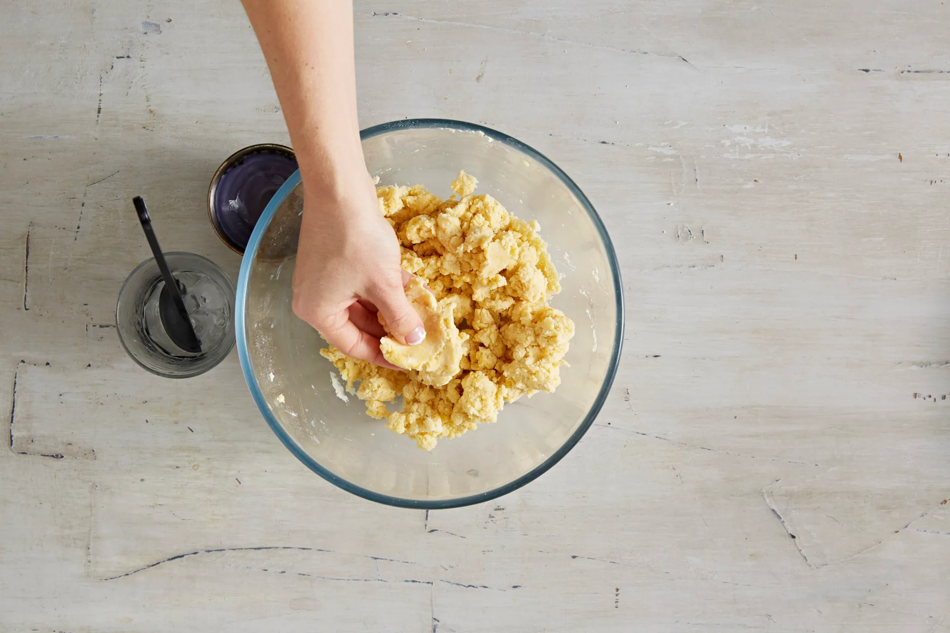 crumbling butter and flour between fingers