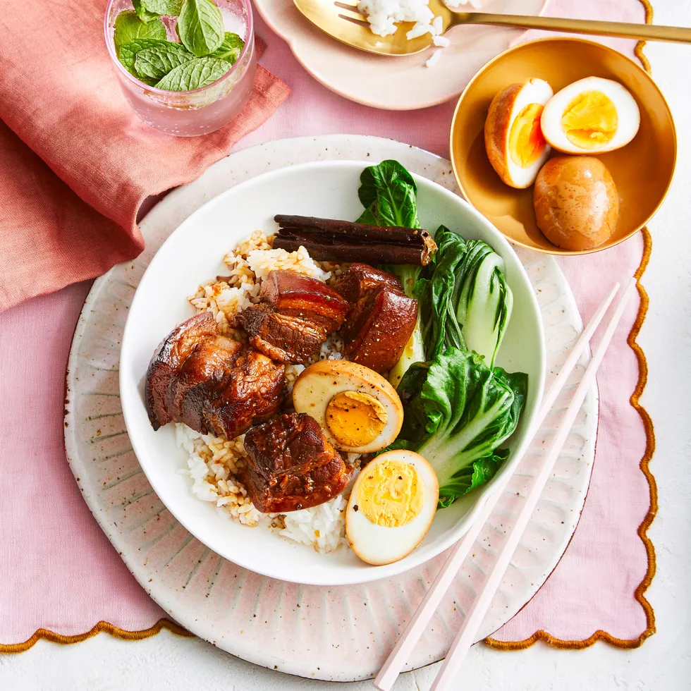 braised pork belly on a pink table place mat