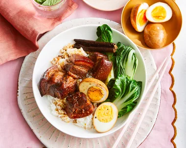 braised pork belly on a pink table place mat