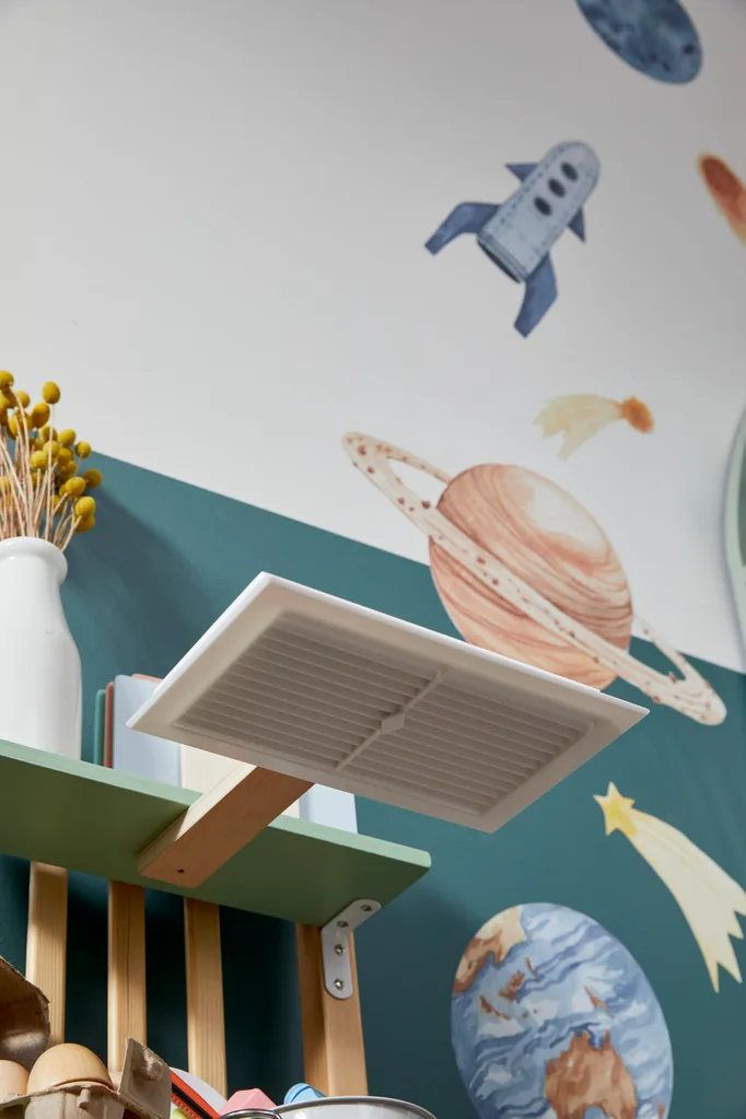 close up of DIY kitchen vent made from wood