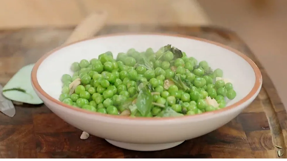 colins peas in a bowl steaming