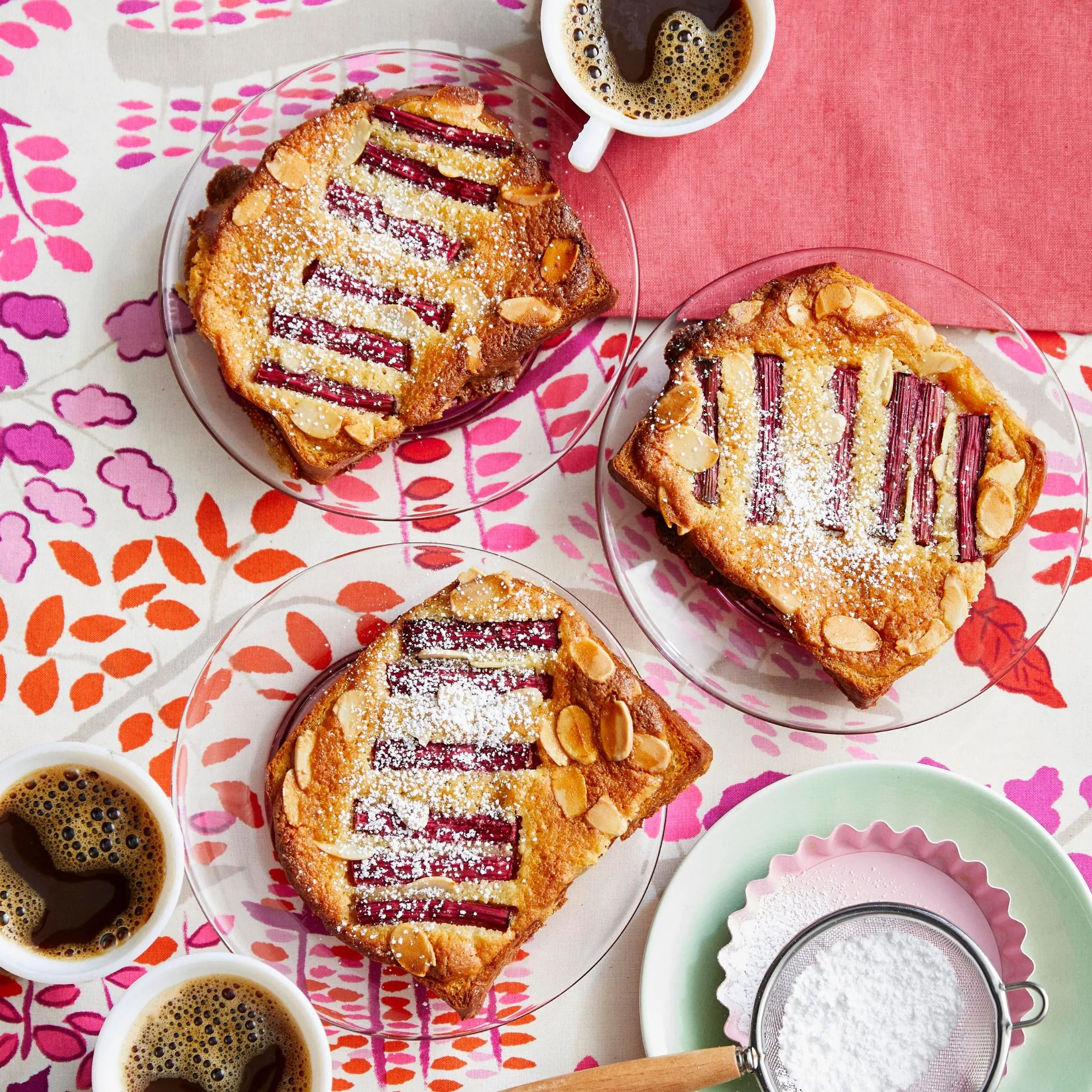 rhubarb croissant toast laid out on table with black coffee