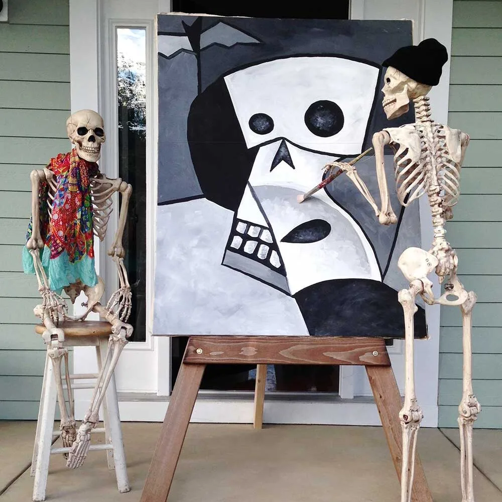 Funny Halloween skeletons posing.