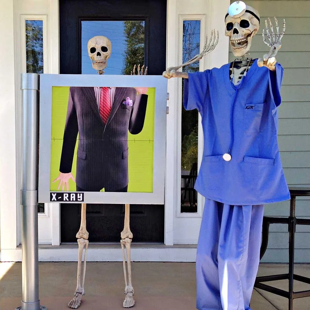 Funny skeletons posing for Halloween