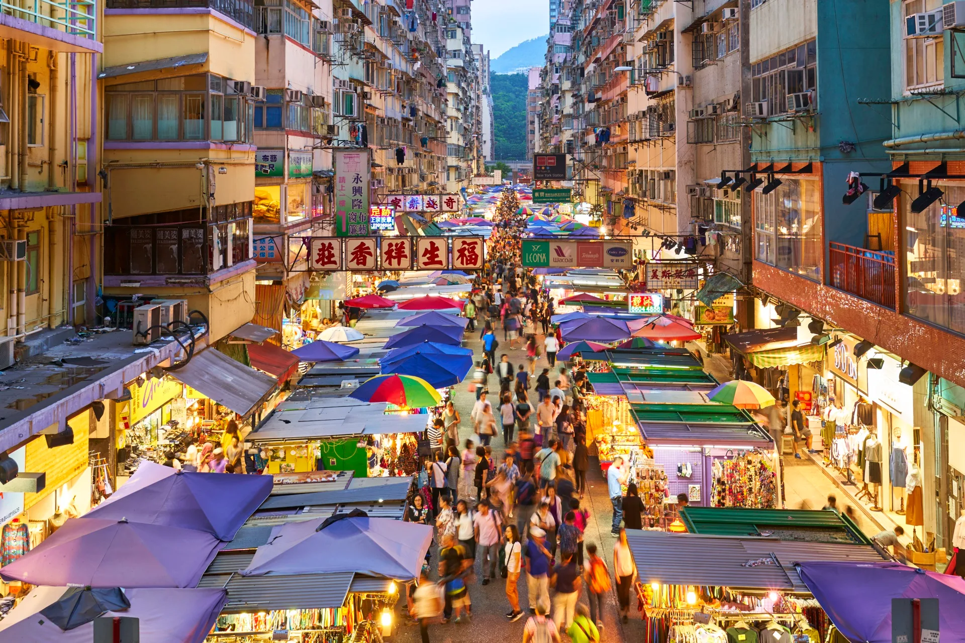 birds eye image of busy street with food stalls and markets