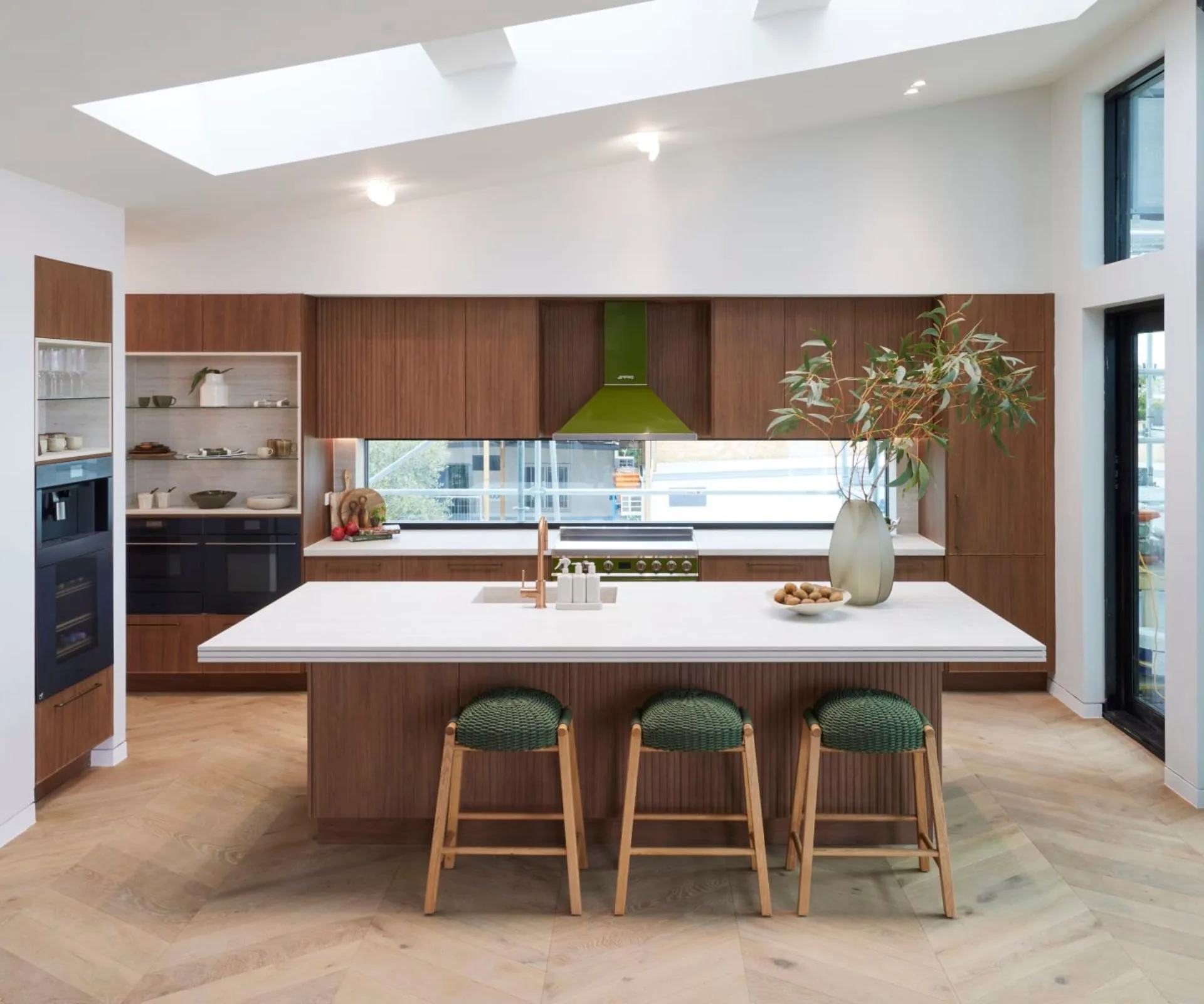 kitchen with walnut cabinetry and green appliances and accessories