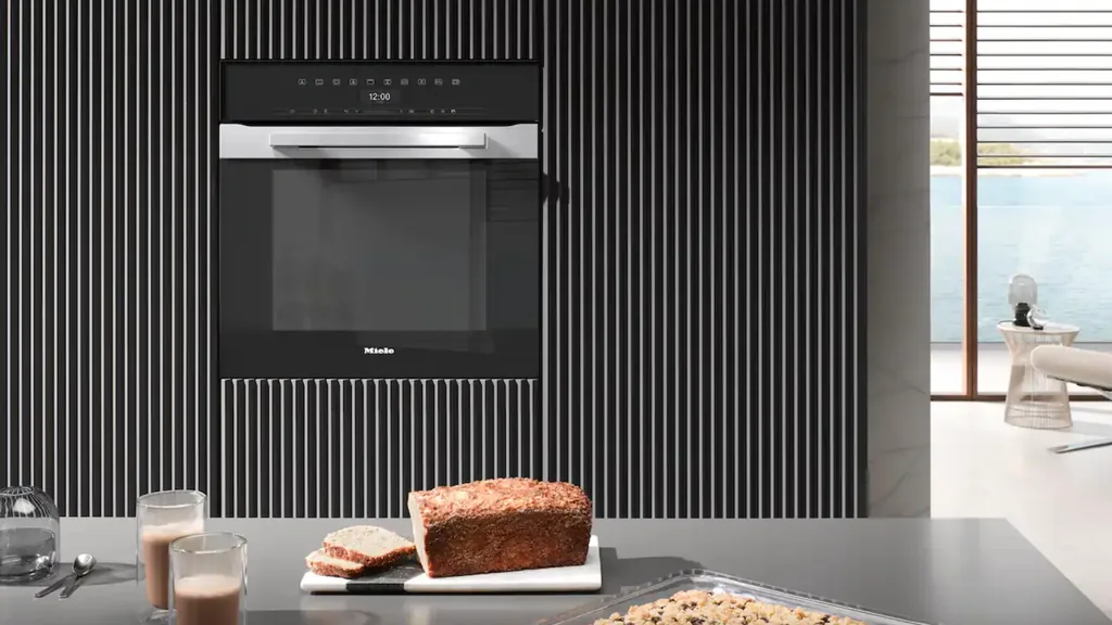 The Miele PureLine CleanSteel 60cm Wide Pyrolytic Oven model H7464BP.