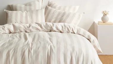 neutral cotton and linen blend bed sheets with stripes