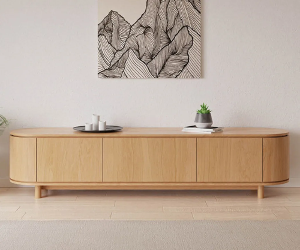 brown natural wood cabinet with curved bent wood ends and cactus on top