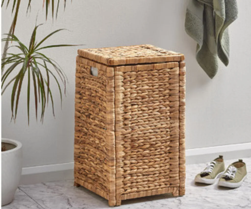 hyacinth weaved launmdry basket from temple and webster sales with handle gaps on either side
