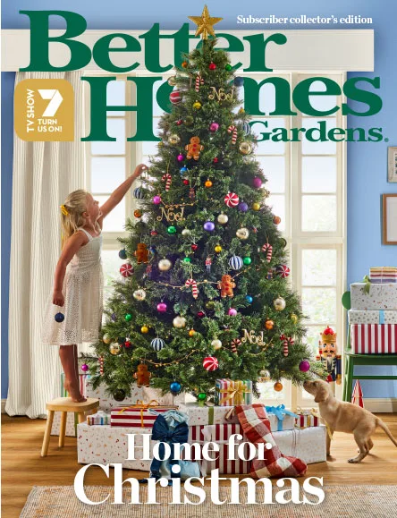better homes and gardens christmas cover with girl and puppy at christmas tree
