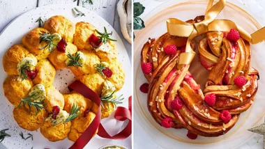 Savory scone wreath with herbs and berries next to a sweet braided bread wreath with raspberries and golden ribbon.