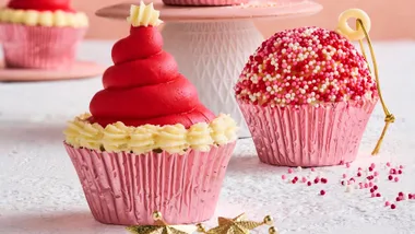 santa hat and bauble christmas cupcakes