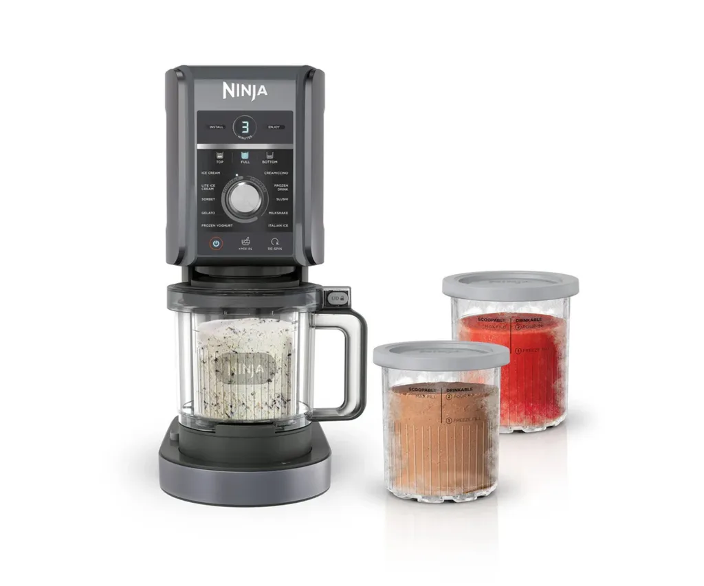 ninja creami deluxe standalone image with extra pots filled with strawberry and chocolate ice cream