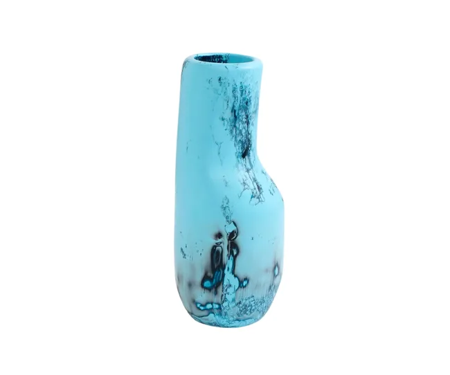 Blue ceramic vase with a slightly irregular shape and dark, marbled patterns around the base against a white background.