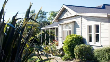 Exterior and garden of an 1800s home.