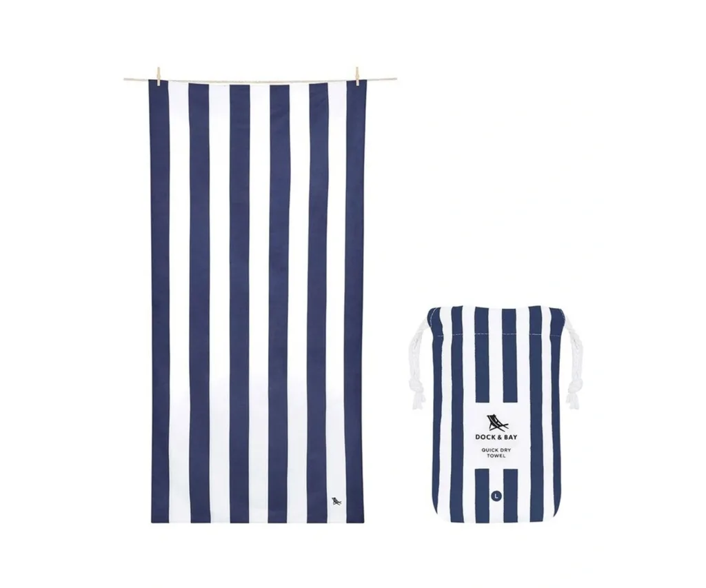 stripy navy towel spread out on clothesline with image of bag with drawstring next to it
