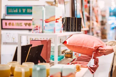 A stylish display of luxury homeware items in a department store.