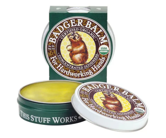 gardeninghand balm with beaver on the front of circular packaging