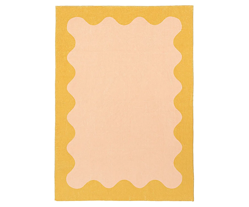 This pink rug with yellow wiggle border on the outside from Miss Amara made it onto our list of best washable rugs Australia for its design and range of sizes.