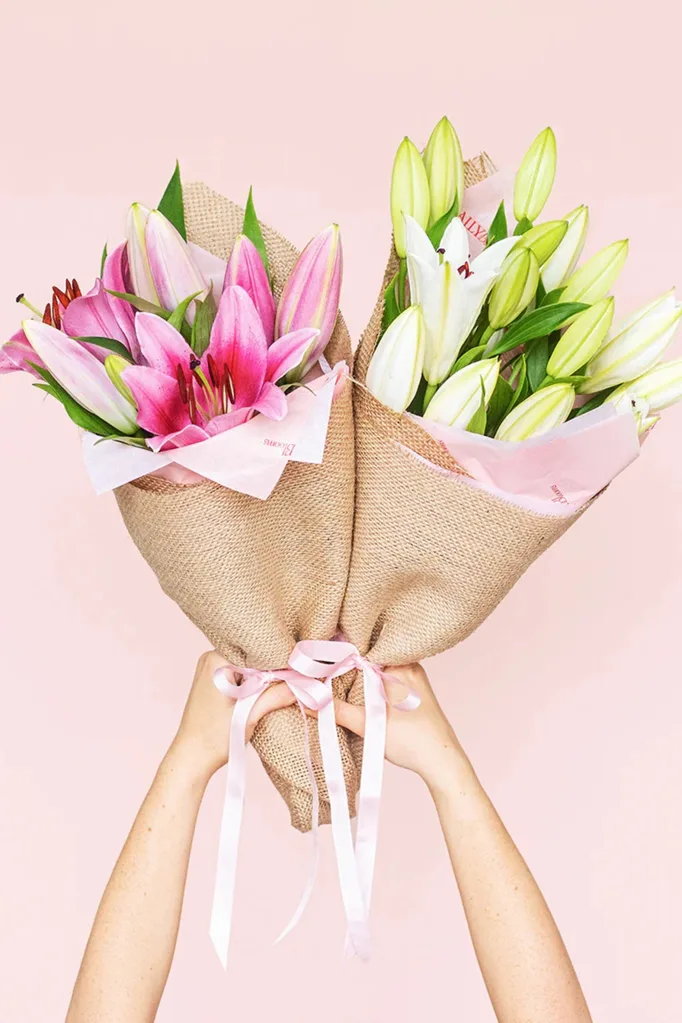 tigerlily bouquets for mother's day wrapped in paper and hessian