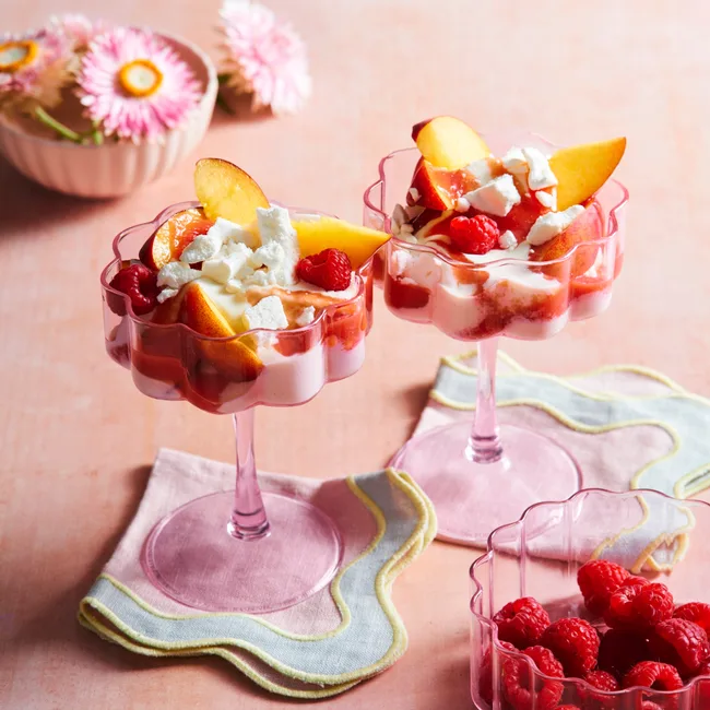 pretty dessert in pink see through champagne glass with waved texture