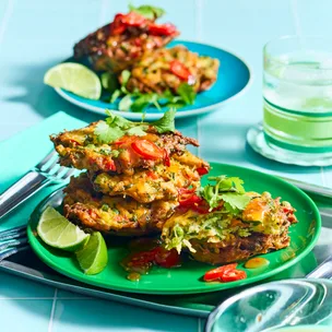 fritters on green plate with blue background