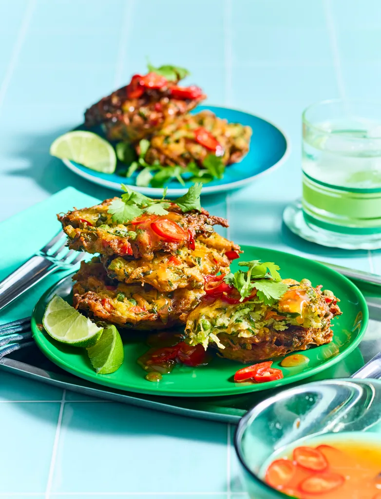 fritters on green plate with blue background