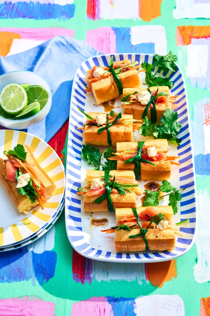 smoked salmon inside brioche rolls with a cucumber salad
