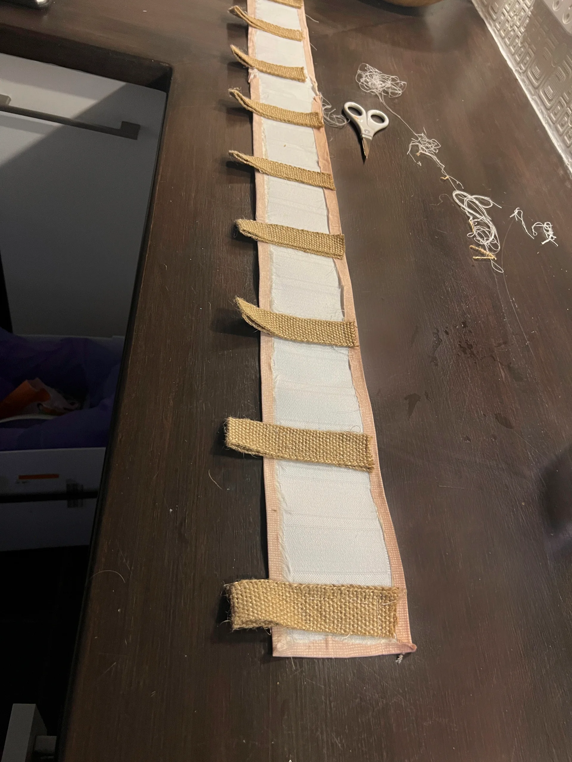 bench with sewing project and scissors