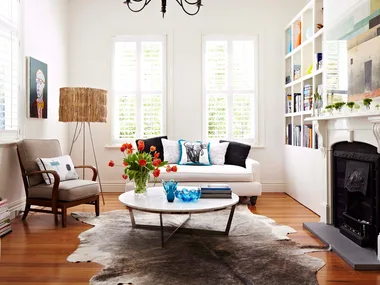 Cosy living room with timber flooring and book shelves