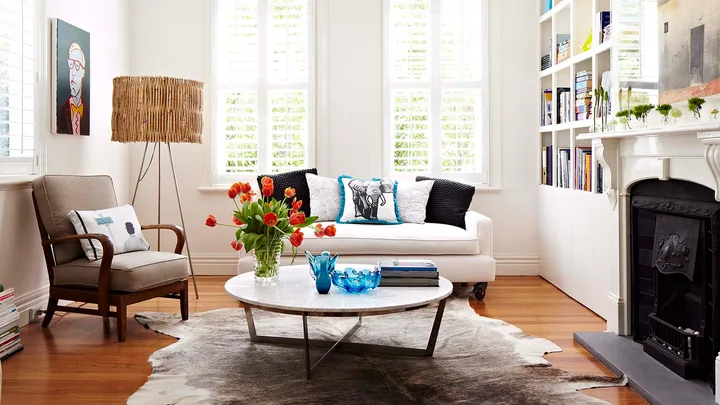 Cosy living room with timber flooring and book shelves