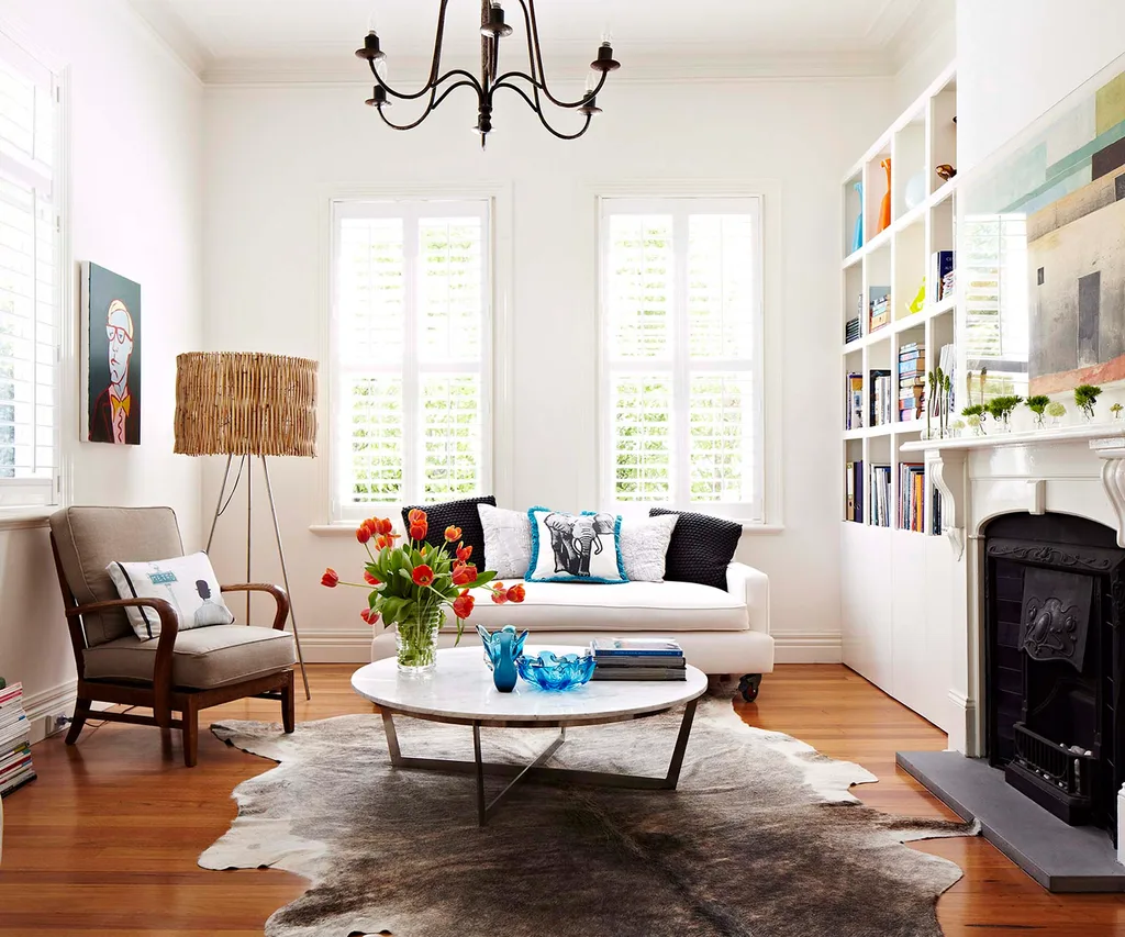 Cosy living room with timber flooring and book shelves