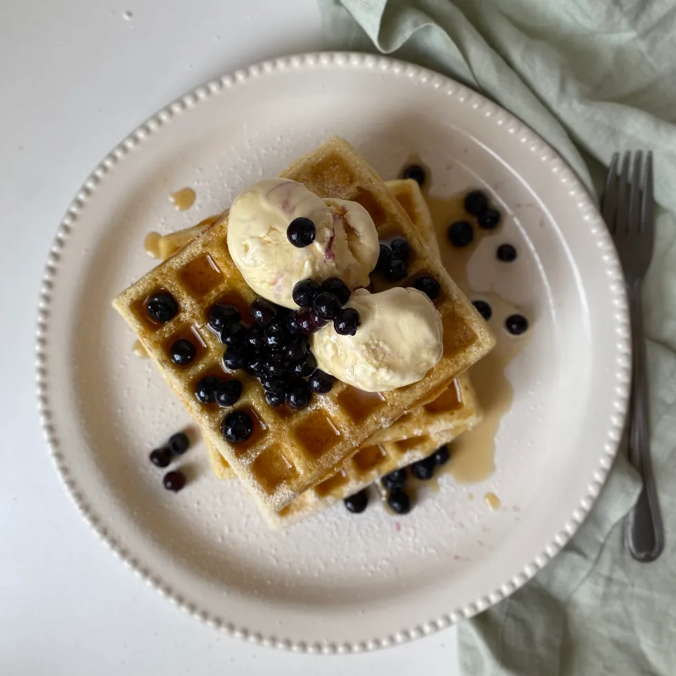 waffles made with microwave waffle maker with ice cream scoops and blueberries on top