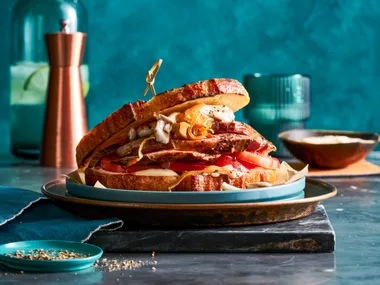 steak sandwich with pickled mushrooms inside
