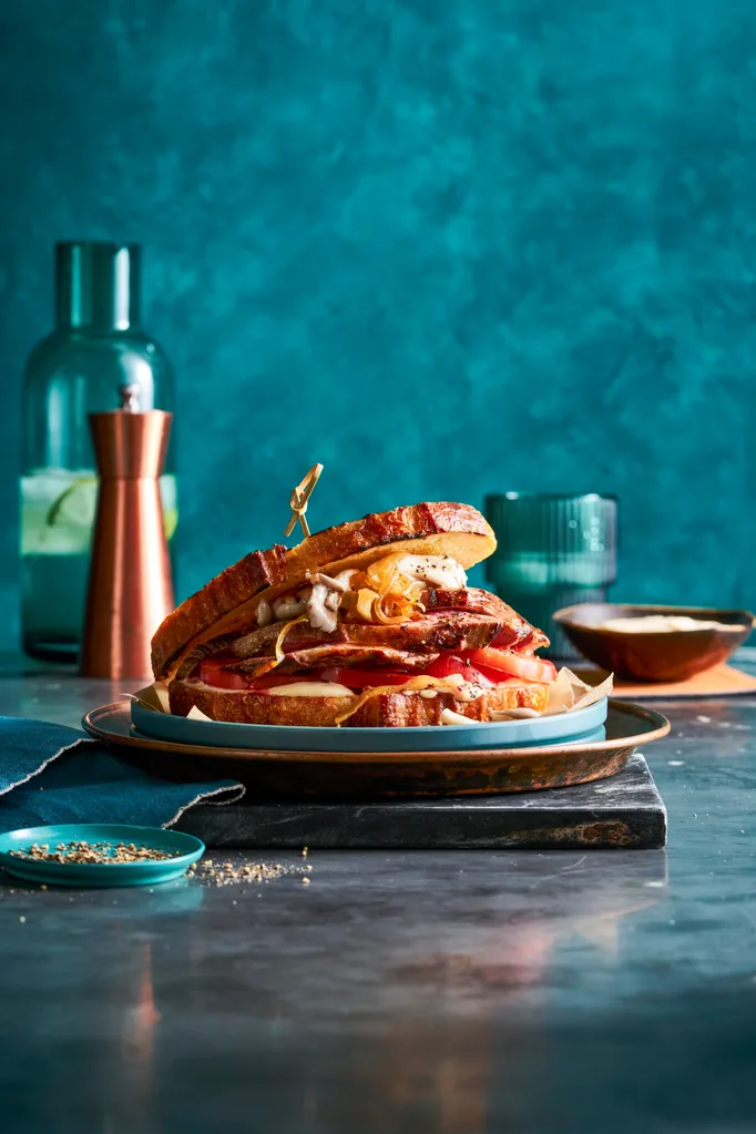 steak sandwich with pickled mushrooms inside