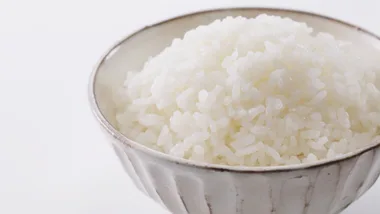 cooked rice sitting in a bowl