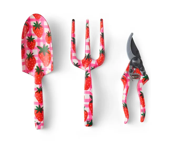 pink strawberry gardening set including a hand spade, hand fork and seccateurs