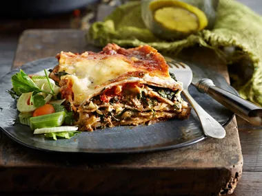 Slice of healthier lasagne with vegetables and cottage cheese