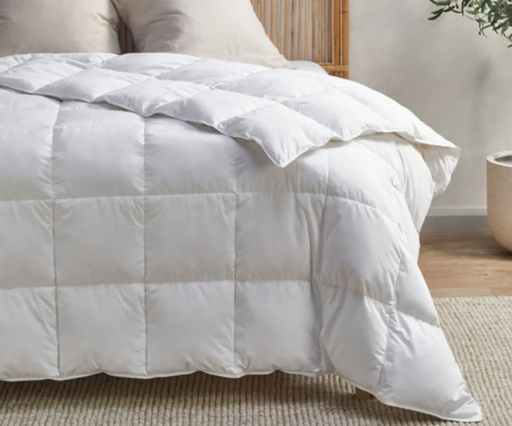 Veda 700GSM Goose Feather & Down Doona in white - on a queen sized bed