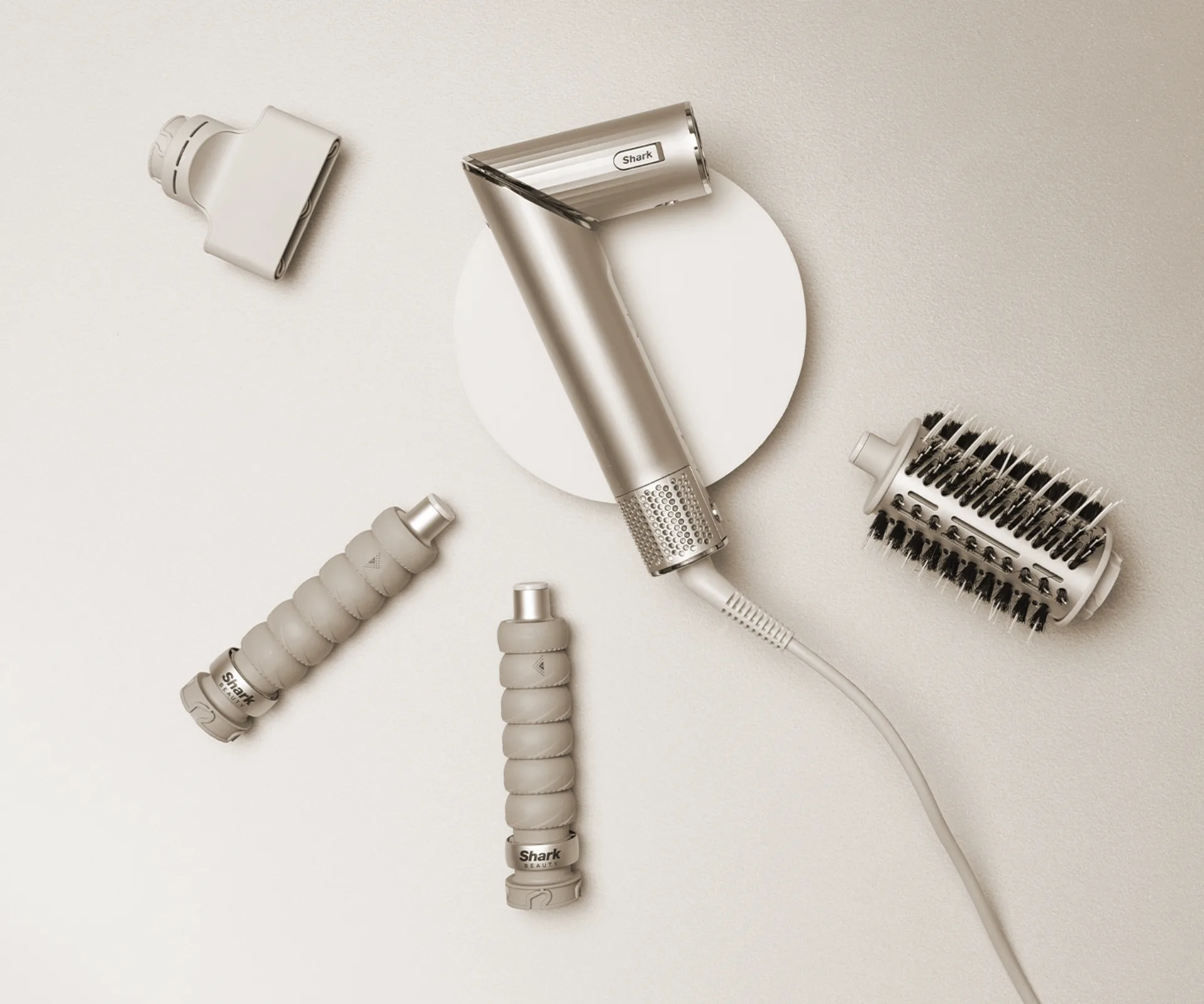 Shark Beauty FlexStyle Air Styling and Drying system laid out on a table with accessories