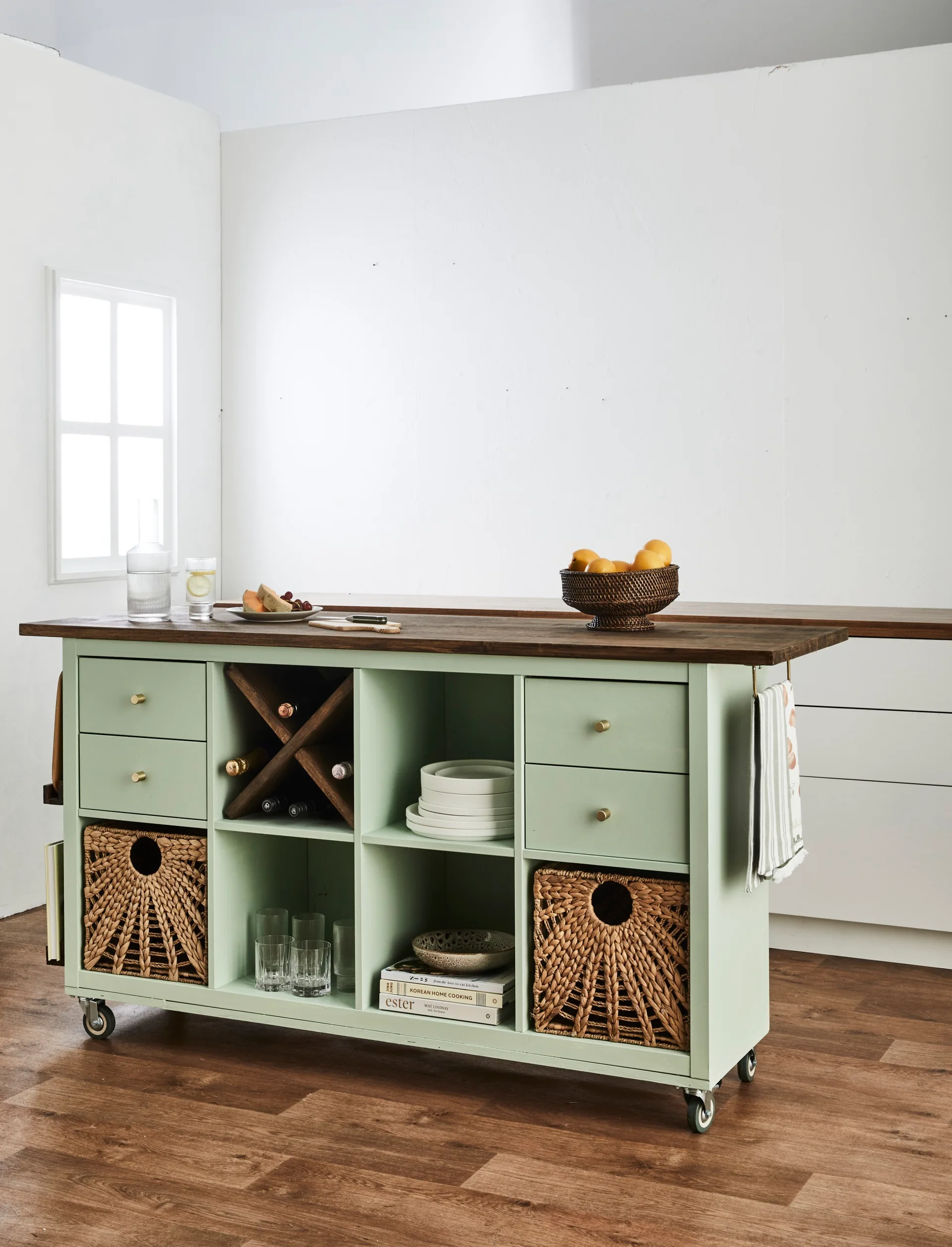 green Kallax kitchen island with baskets and drawers