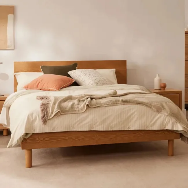 bedroom ideas with wooden bed frame and beige bed clothes