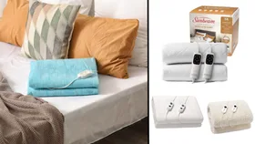 A cosy bed with a folded electric blanket, along with three of BHG's pick of the best electric blankets in Australia.