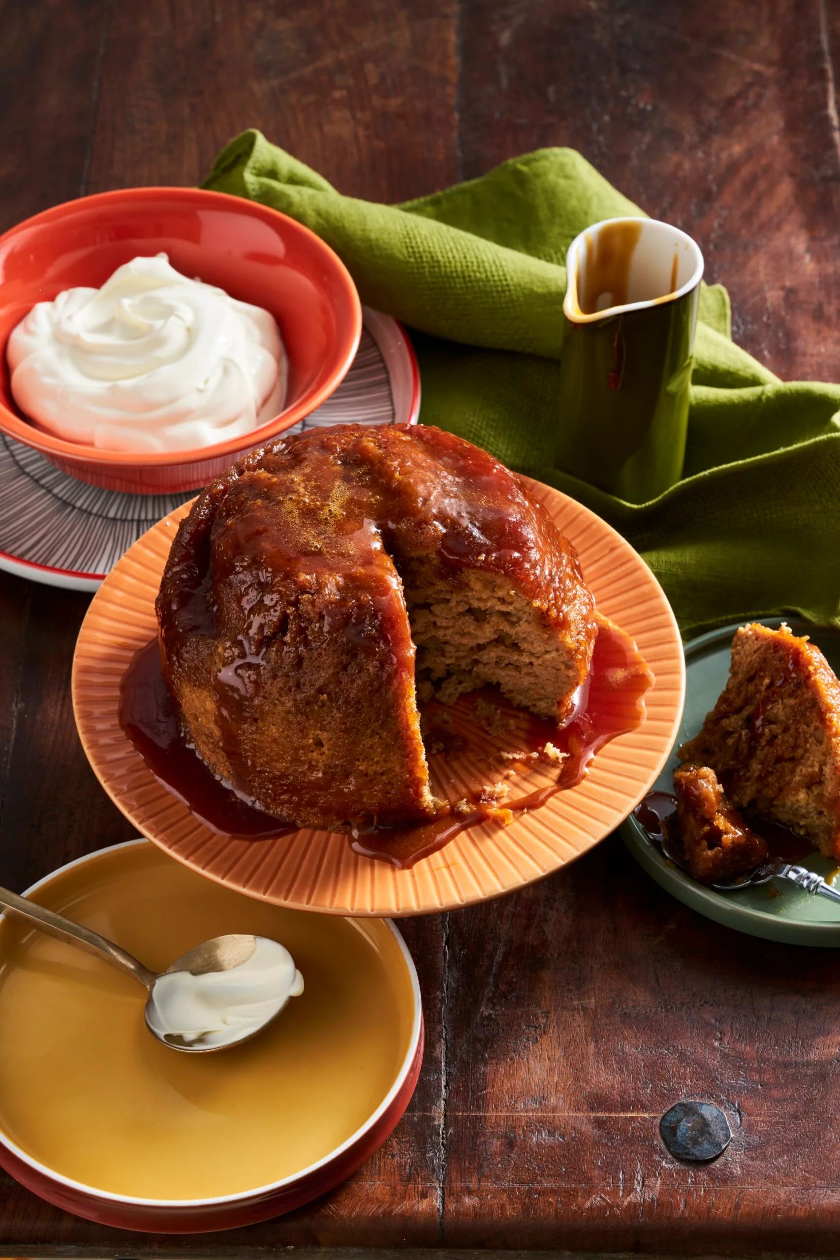 steamed pudding made in the microwave on orange plate