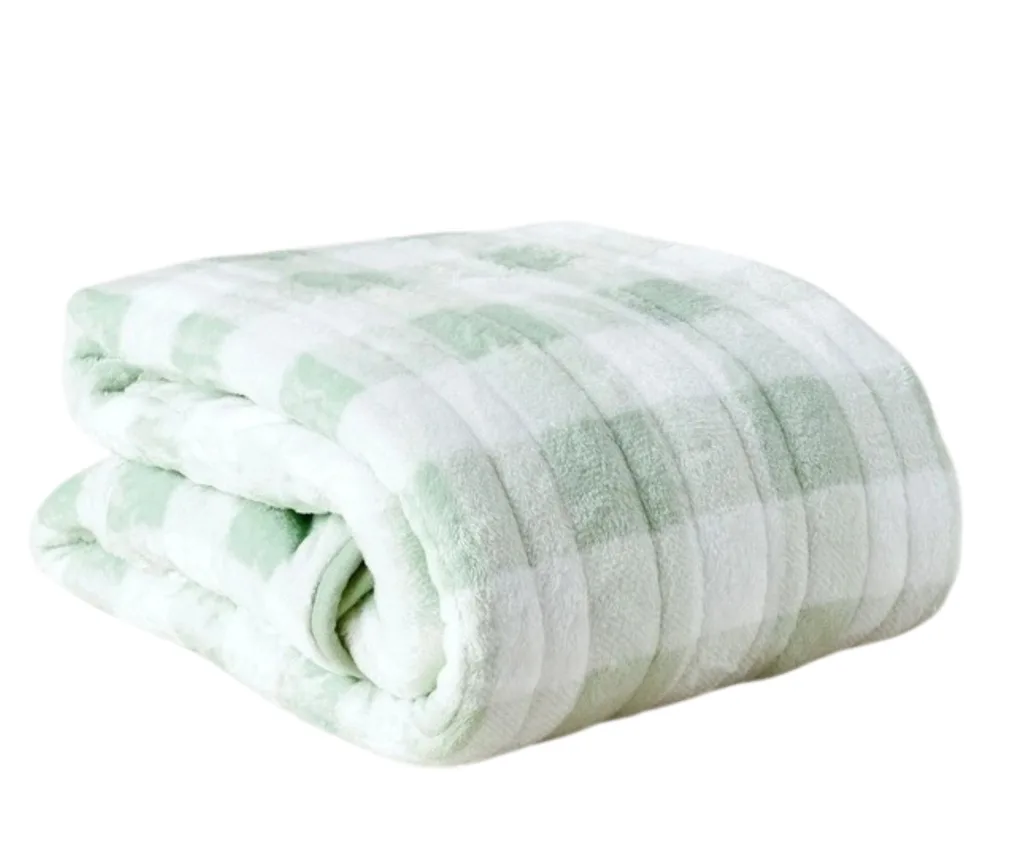folded check throw with sage green and white checks