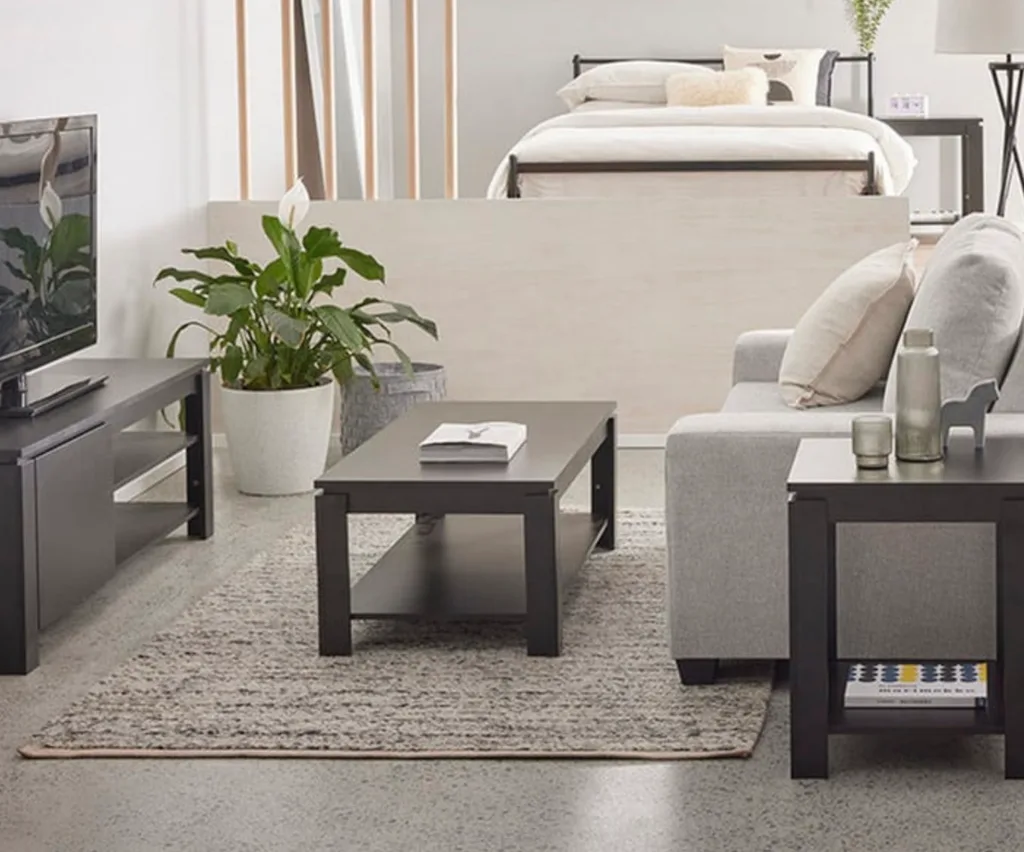 Home Essentials Double package includes a double bed frame and mattress, 4-seat dining table, coffee table, entertainment unit and 2-seat sofa.