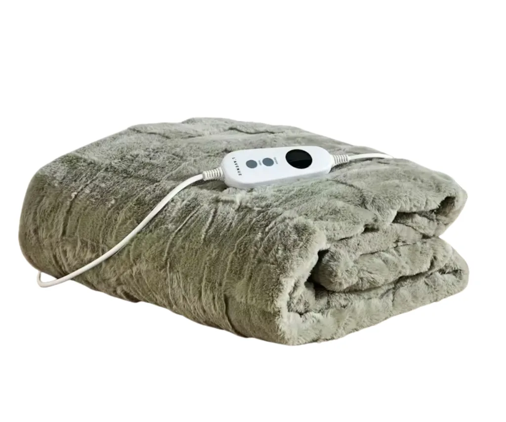 sage heated blanket with remote sitting on top